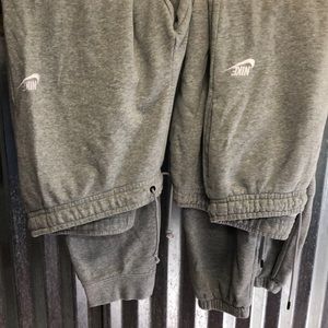 2 pair gray Nike joggers